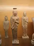 Korai (maidens) with doves
