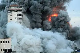 Highrise residential building "Palestine Tower"[25] in Gaza following an Israeli strike during the Gaza war.