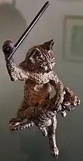 A cat chewing another with rice twigs. Norsk Folkemuseum, Ibsenmuseet (NF.2019-0541), identical to the lost figurine (NF.1914-0490A).