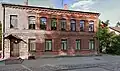 Typical 19th century red brick building in the centre of former Krustpils.
