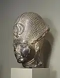 This statue shows Amenhotep III (recarved as Ramesses II) wearing the khepresh crown. Walters Art Museum, Baltimore.