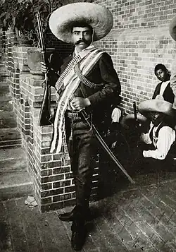 General Emiliano Zapata, leader of revolutionaries in Morelos beginning in 1911 and ending in his assassination in 1919[140]