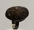 A female figure hovering in front of a tree. Gournia, 1600–1300 BC.