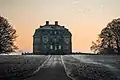 The Hermitage Lodge seen from the west at sunrise in January