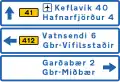 Destination ahead (a) with distances within the Capital Region