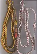 Fourragere with colors of the Médaille militaire, with olives of the Croix de guerre 1914-1918, Croix de guerre 1939-1945 and Fourragere with colors of the Croix de guerre des théâtres d'opérations extérieures