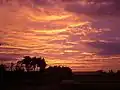 Sunset over the Bates College track in Lewiston, Maine