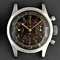 Gallet Clamshell (1943) with military style black dial, hands and dial indications in gold