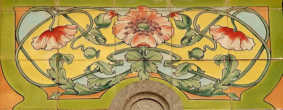 Panel on the façade of Genval railway station in Rixensart, Belgium, designed by architect G. De Lulle (1910)