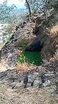 Rock cut water cistern