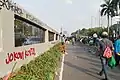 Graffiti on crowd control barriers to the JIRR tollway.
