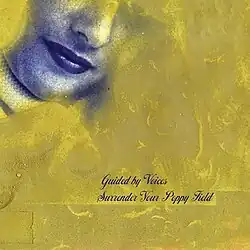 A golden painting with a blue mouth in the upper left corner