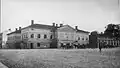 In 1899, a two-floor stone building built in 1830 was located on Kauppiaskatu, which contained the restaurant of Hamburger Börs. On the edge of the Market Square was the Forss House which hosted the press of the Uusi Aura newspaper.[5]