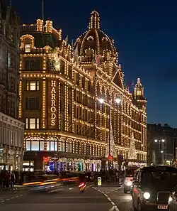 The Harrods building frontage at night