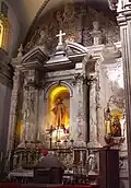 The unusual double High Altar.