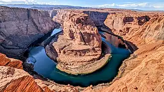 Incised meander caused by downcutting of Colorado River during uplift of Colorado Plateau