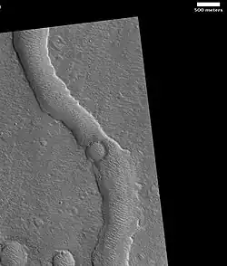 Hypanis Vallis in the Lunae Palus quadrangle of Mars, as seen by HiRISE. Scale bar is 500 meters long.