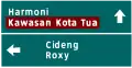3-way directional sign. Kawasan Kota Tua, a tourist attraction, is highlighted in brown