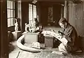 Photograph of two Japanese ivory carvers