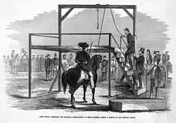 Brown ascending the scaffold preparatory to being hanged. From Frank Leslie's Illustrated Newspaper, December 17, 1859