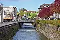 The river canal within the village of Jona