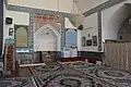 Inside one of the prayer halls, with a mihrab visible