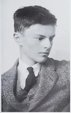 White teenage boy with neat dark hair