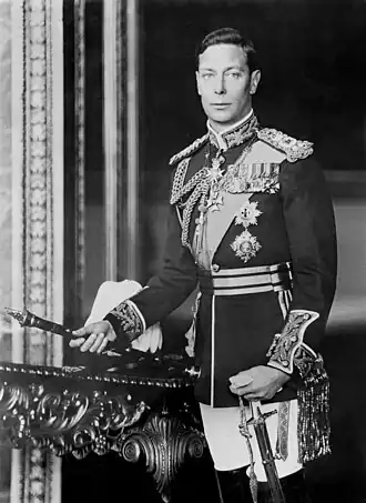 Man standing in royal regalia