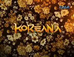 Images of flowers, over a black background. The series title is displayed on the center of the image. The logo of GMA Network is displayed on the upper right side of the image.