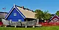 Wooden houses at Nida, Curonian Spit, Lithuania, decorated with traditional weathervane
