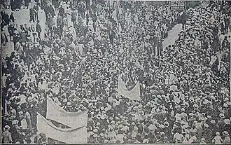 A crowd gathered to welcome the heroes.