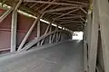 The inside of the bridge showing the Burr arch truss