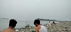 Local residents of Hund village bathing in the Indus River during the summer, a common practice for cooling off and coping with power shortages.