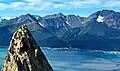 Lowell Peak centered in the distance behind Seward. Marathon Mountain to right