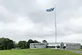 View of the circular walls and the flag pole