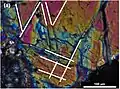 Olivine in Ribbeck, showing fracture lines, indicative of shock metamorphism