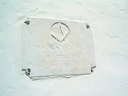 Plaque of the Masonic Lodge which has been housed in the State House since 1815