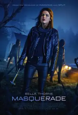 A woman holding a hammer stands in front of two masked burglars with knives.