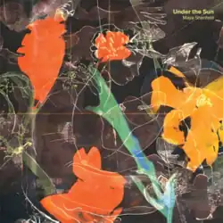 Various floral colours over an indistinct patterned gray background