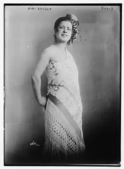Mimi Aguglia, standing