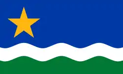 The North Star Flag features blue over a field of green separated by an undulating white band. A yellow five-pointed star is emblazoned in the upper left.