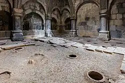 Library and scriptorium (storage jars were later inserted into the floor)