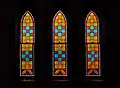 Windows below the rose window