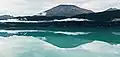 East aspect of Mount Adair reflected in Kenai Lake