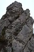 Sloping sides of a rocky ridge.