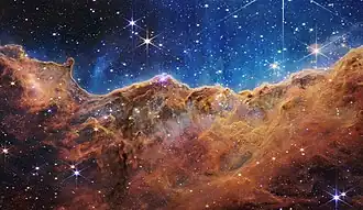 The Cosmic Cliffs, a star-forming region.