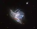 NGC 6052 observed by Hubble with its WFPC2 camera.[8]