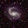 NGC 6907 taken by 2MASS. NGC 6908 can be seen at the eastern arm.