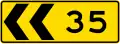 Curve marker with integrated advisory speed