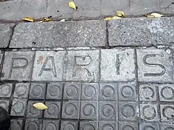 Letter tiles, Paris street.